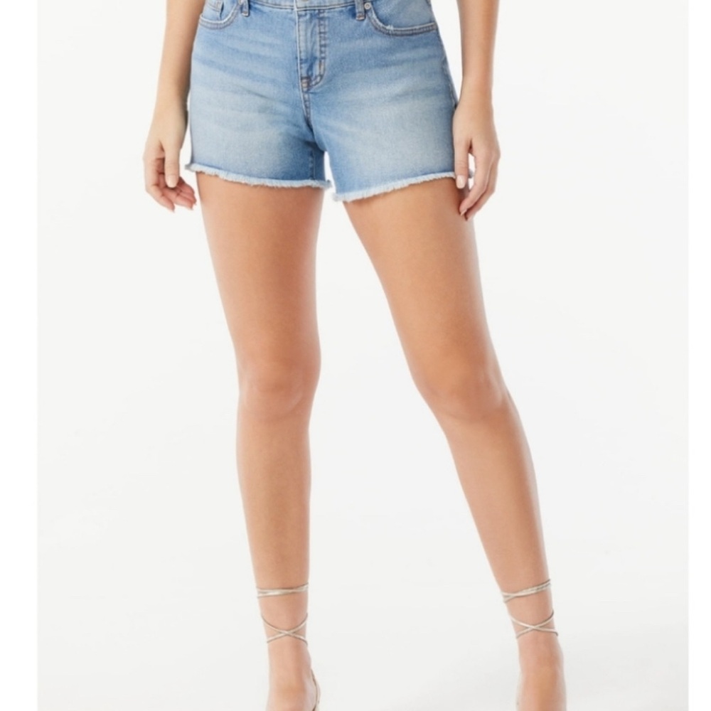 Sofia Vergara Woman's and Woman's Lila
Distressed High Low Hem Shorts size 10
